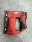 Milwaukee 2447-20 12V Cordless Stapler Gun Red/black. Fixed Price $70.00.