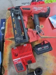 Milwaukee 2841-20 18V 16-GAUGE Nail Gun W/XC5.0 Battery & Charger Free Ship!. Fixed Price $324.95.