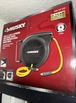 Husky 3/8 In. X 50 Ft. Hybrid Air Hose With Self-retracting Reel 1003177432. Fixed Price $70.00.