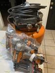 New Ridgid 6 Gal. Portable Electric Pancake Air Compressor W/ 18GA Brad Nailer. Fixed Price $250.00.