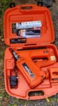 Paslode Impulse Cordless Nail Gun Kit, 2 Nicd Batteries, Charger, Orange. Fixed Price $105.00.