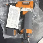 Ridgid R138HPA Pneumatic Upholstery Stapler Dual Trigger Orange Gray. Fixed Price $54.99.