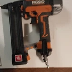 Ridgid R213BNF3 18 Gauge Brad Nail Gun Orange Black With Operator's Manual. Fixed Price $50.00.